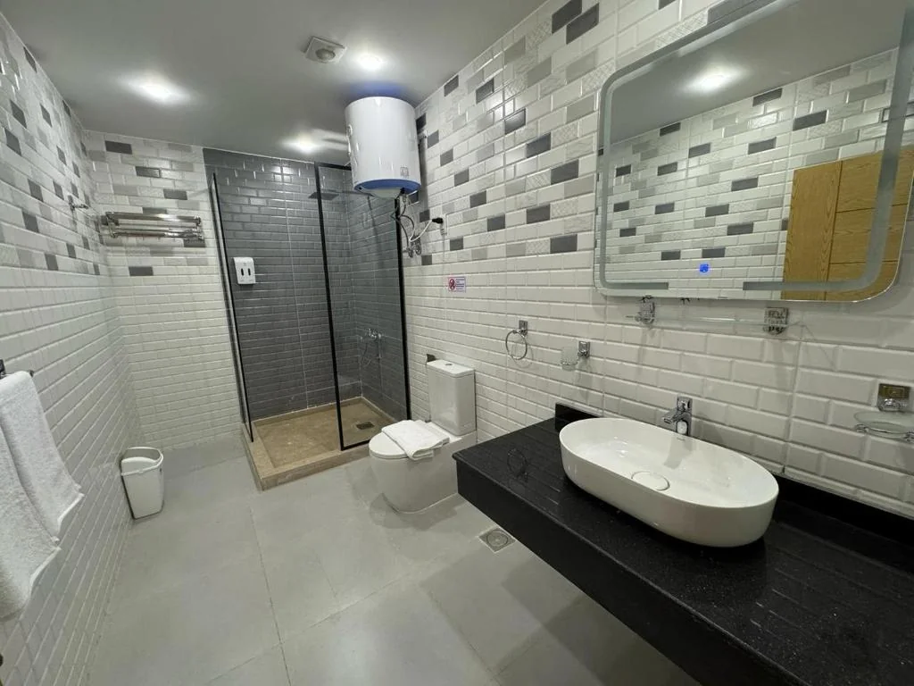 Modern private bathroom at Dyafa Pyramids Hotel and Spa