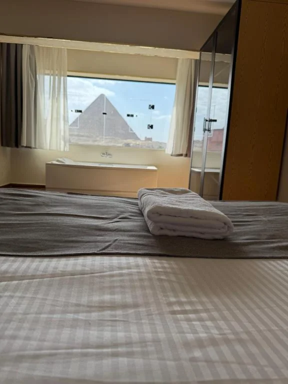 Private room overlooking the Giza Pyramids at Dyafa hotel