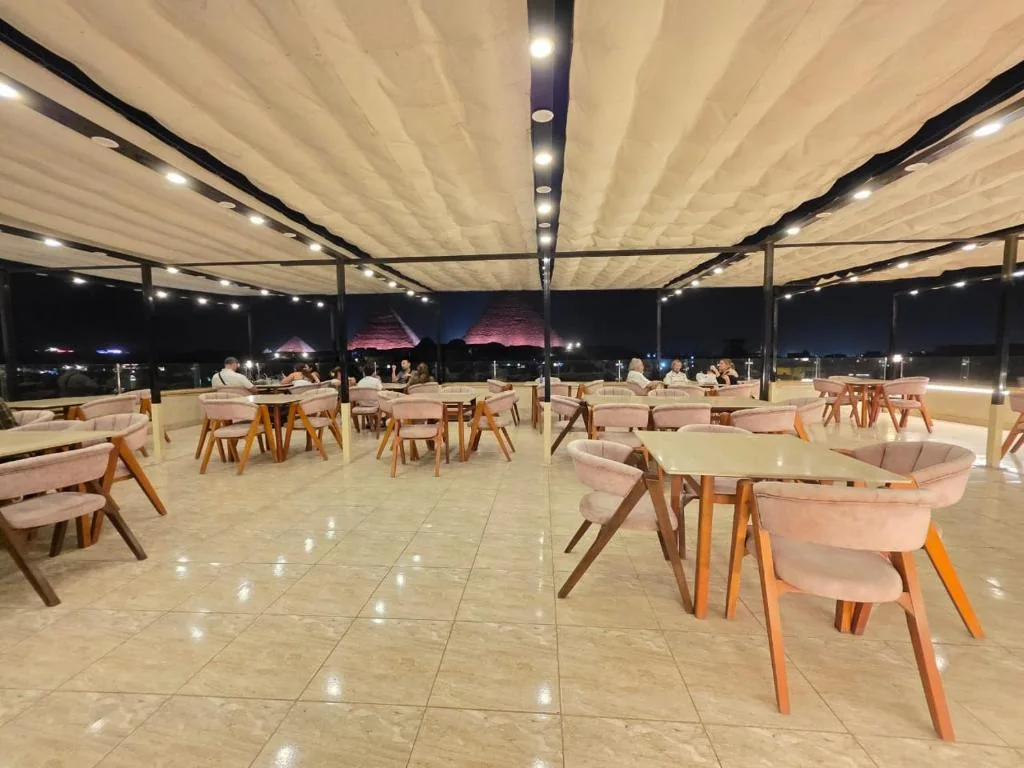 Large rooftop seating area at Dyafa Pyramids Hotel and Spa