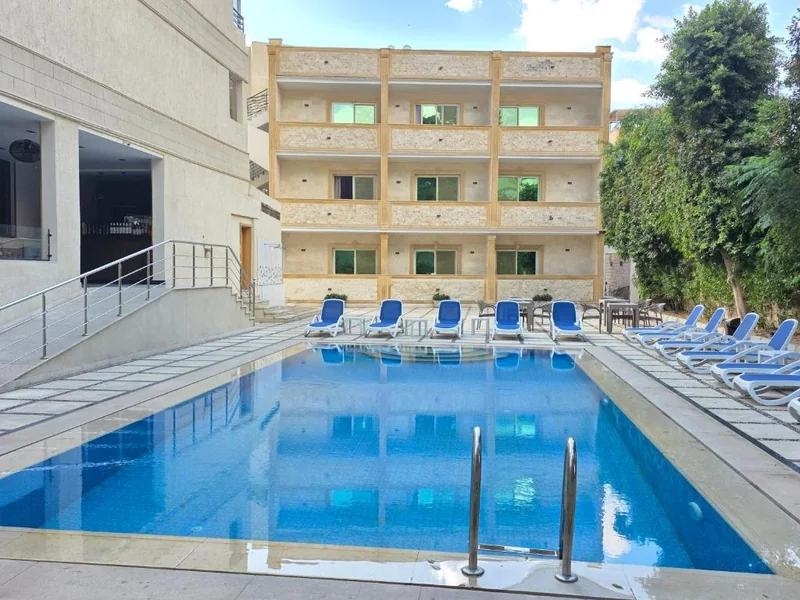 Outdoor swimming pool at Dyafa Pyramids Hotel and Spa